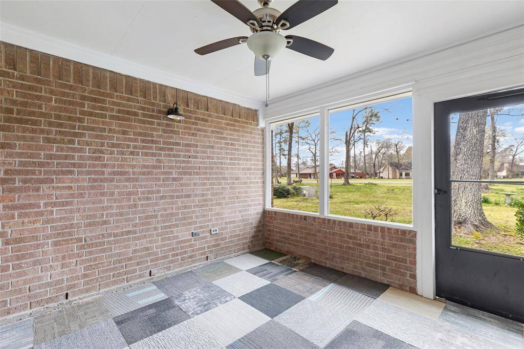 Screened porch off of dining room and kitchen