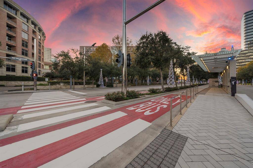 Located on vibrant Post Oak Boulevard, this urban scene offers direct access to the heart of Houston's lively Galleria area. Enjoy nearby dining, shopping, and entertainment options, perfectly encapsulating the convenience and excitement of city living.