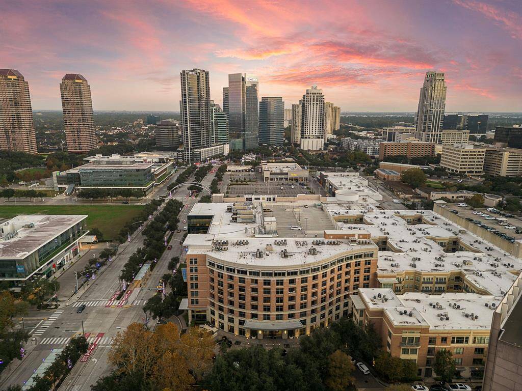 Embrace vibrant city living with a breathtaking aerial view over Houston's Galleria area. An ideal setting for those seeking both modernity and convenience in a prestigious location.