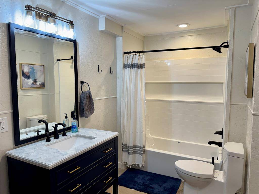 Additional full bathroom downstairs.
