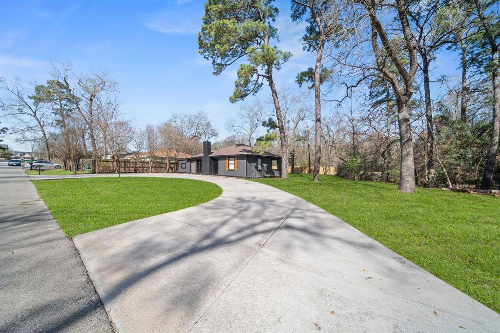 Front exterior showing large circle driveway