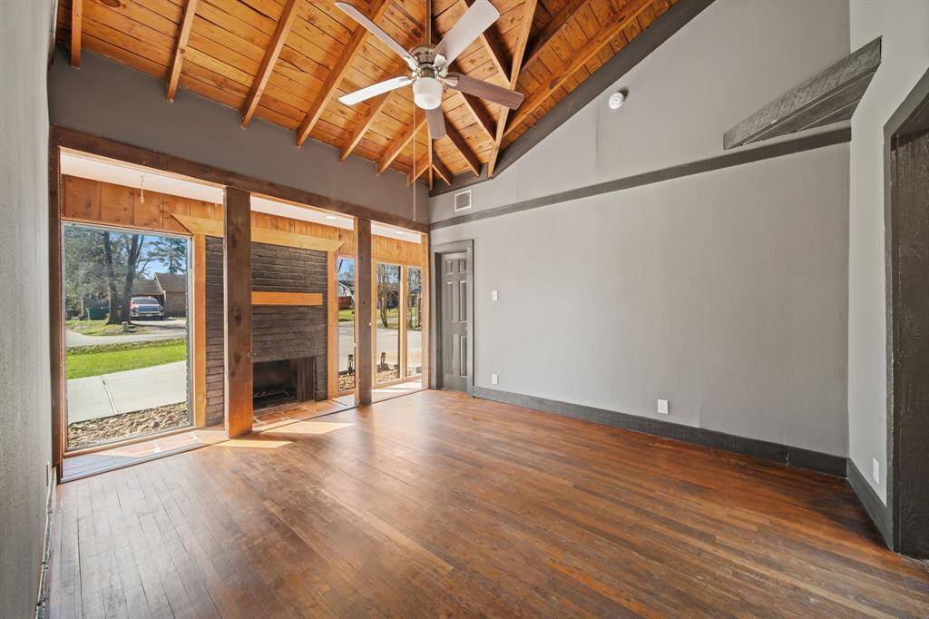 Living room with vaulted ceilings