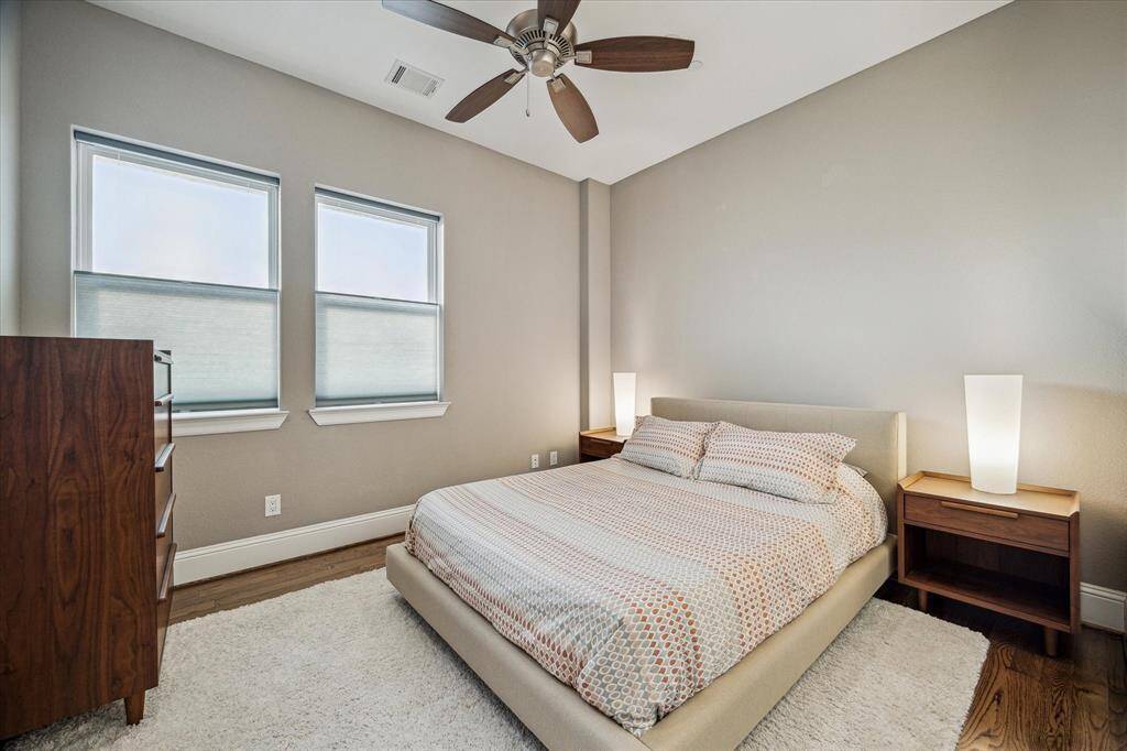 Cozy ground floor bedroom with natural light and modern elements.