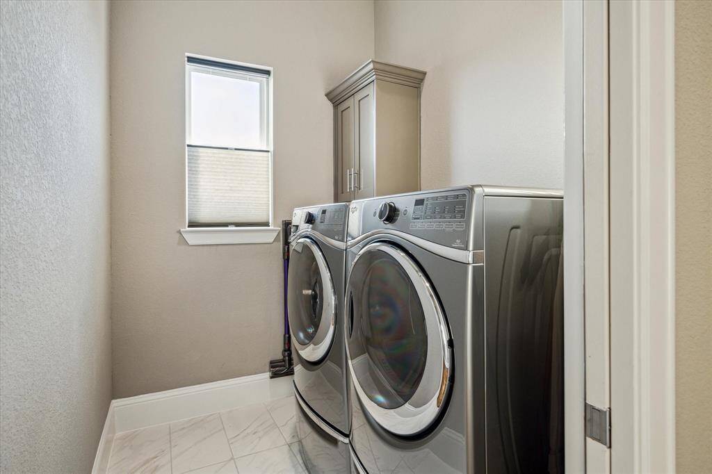 Convenient third-floor utility room.