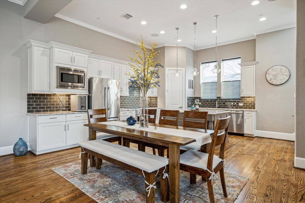 This inviting kitchen and breakfast area offer an ideal space for daily living.