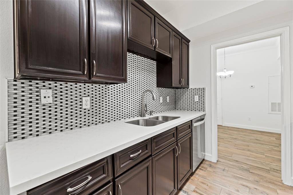 Remodeled Kitchen, new backsplash and flooring **2255 Braeswood Park Unit 240, Houston, TX 77030**