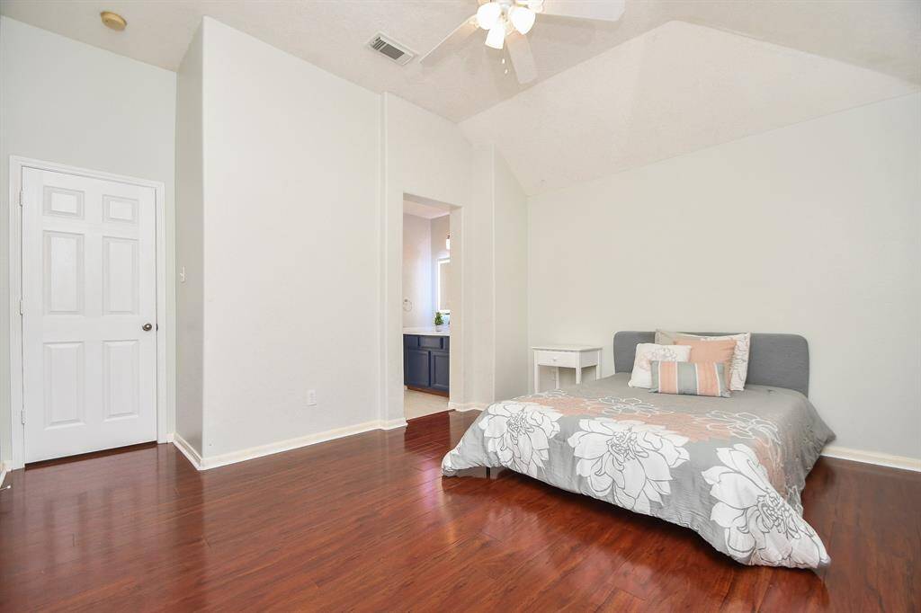 Another view of the secondary bedroom with access to a jack and jill bathroom. There is plenty of room for a study table and additional furniture.