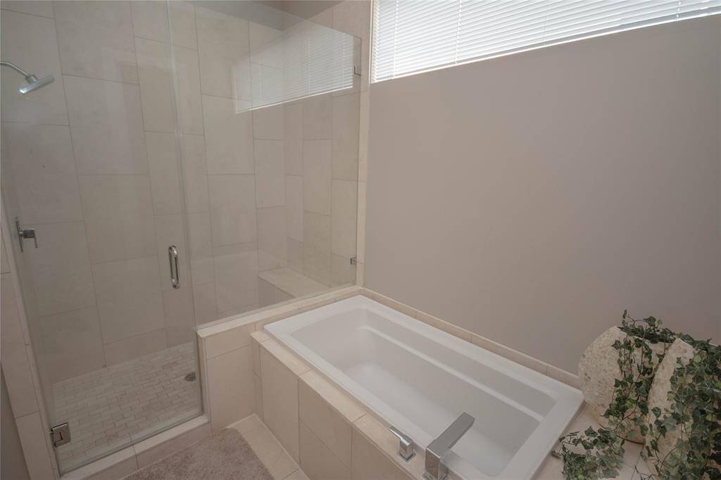 Large shower with seat and a jetted tub when you just want to soak