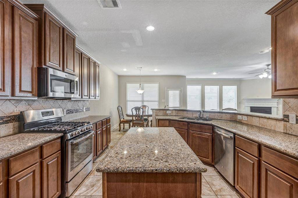 Kitchen Islanld with lots of cabinets storage space.