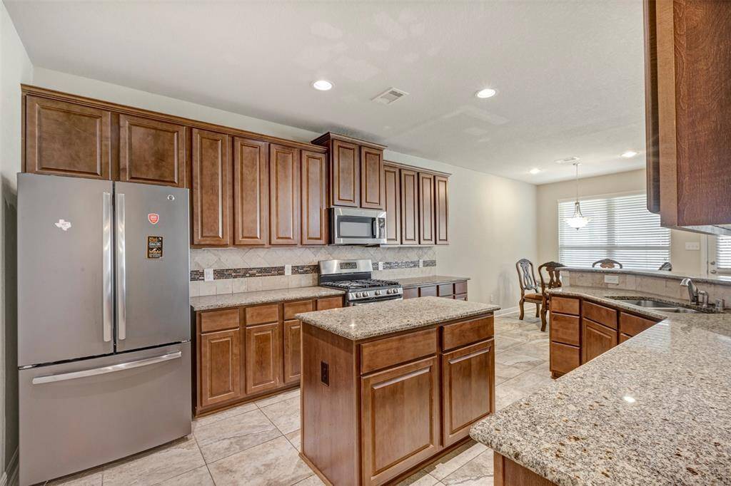 Kitchen with Stainless Steel Appliances.