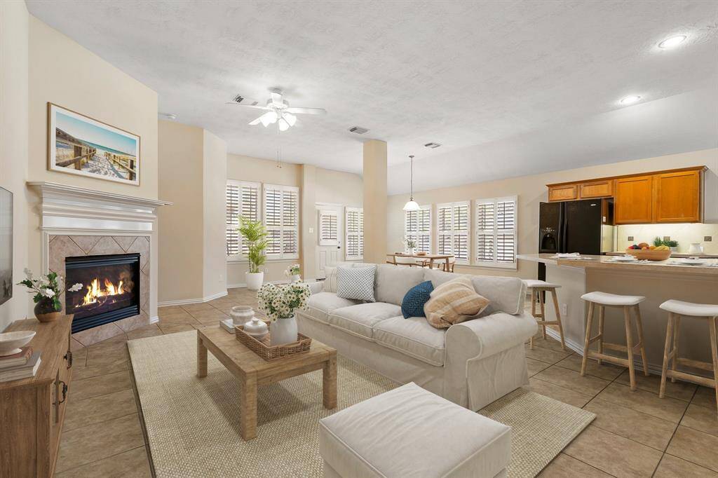 Large open space in living area w gas fireplace.