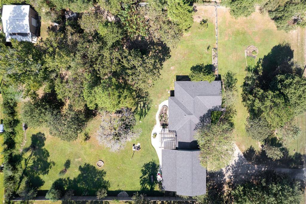 This aerial shows the house and the 1.3 acres.