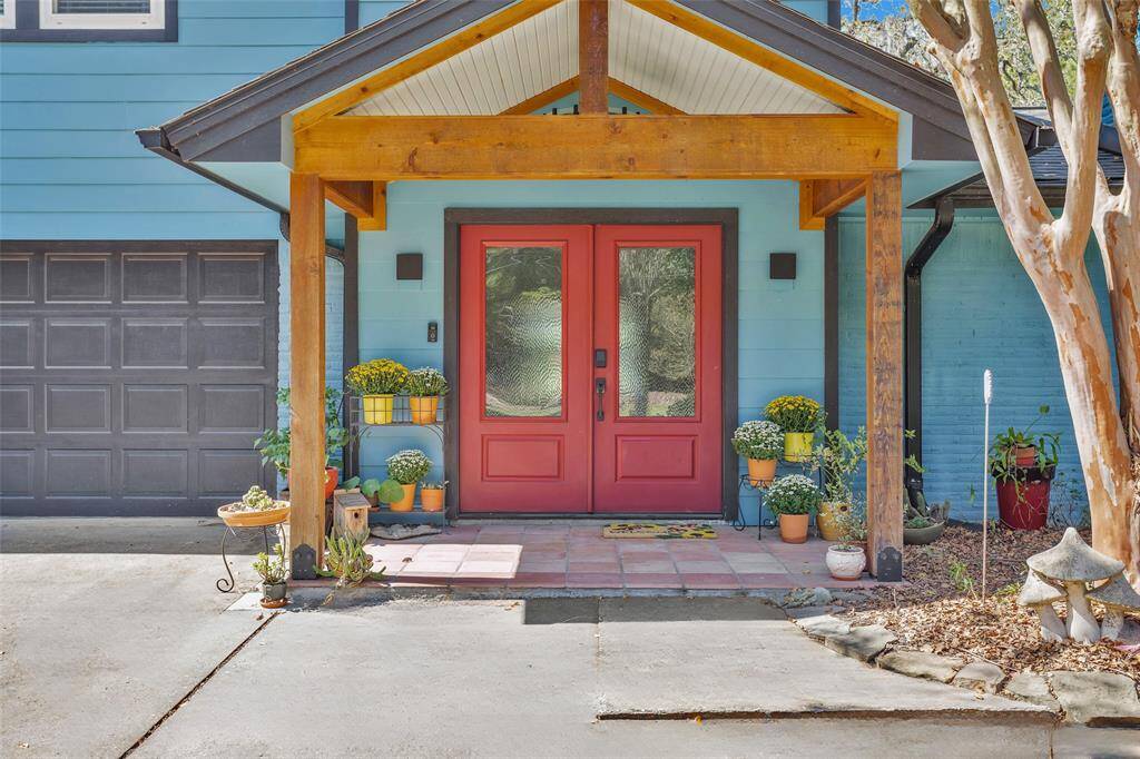So much character greets you through the double doors of this 3,561 sq ft - 5 bedroom, 3.1 bath, 3 car garage (1 car bay is currently used as a Dark Room...can be turned back into parking bay) home.