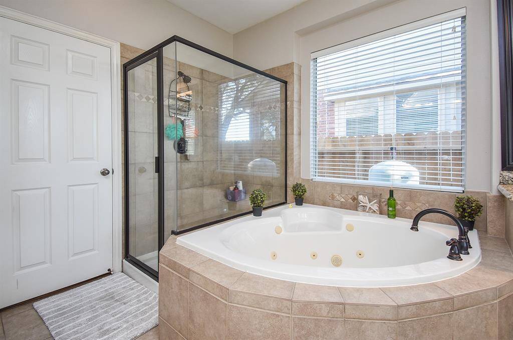 Primary bath jetted tub with separate shower
