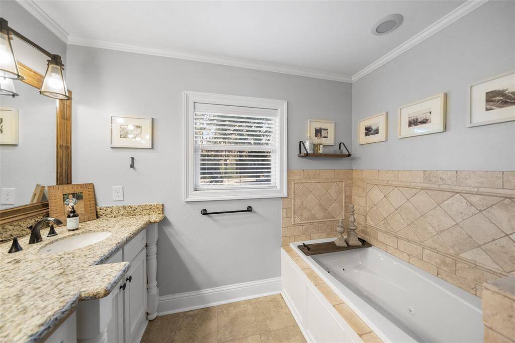 Jetted tub and seamless glass shower too!