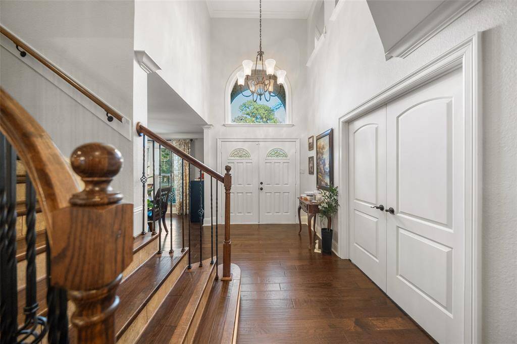 Staircase is tucked in allowing a great sight line to the back of the home.