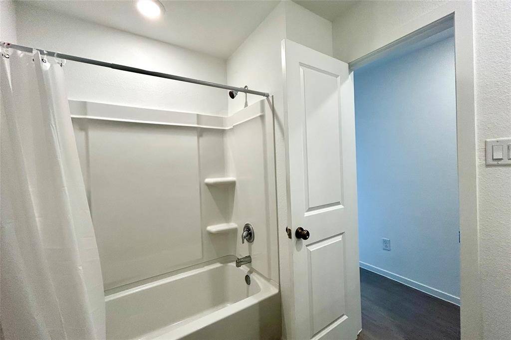 Shower curtain installed for secondary bathroom