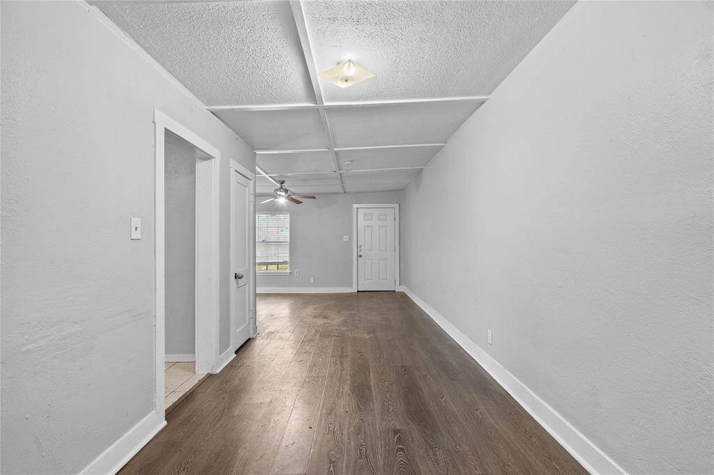 Hallway to primary bedroom