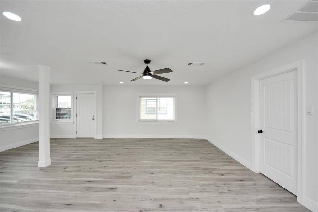 Luxury vinyl plank flooring throughout.