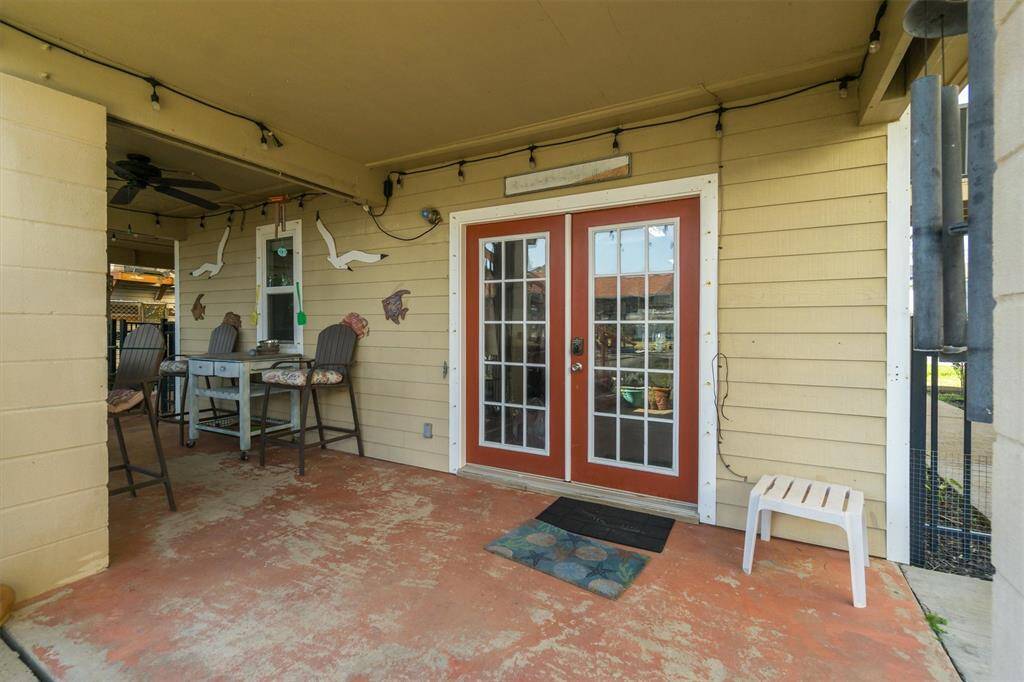 Stairs up to the back deck and sunroom.  Love this yard. Fenced in and great for kids and pets
