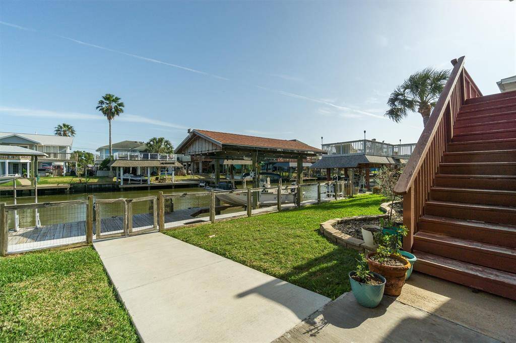 Super fishing pier.  Boat house for your water ride.  Also has a ladder should you want to take a swim