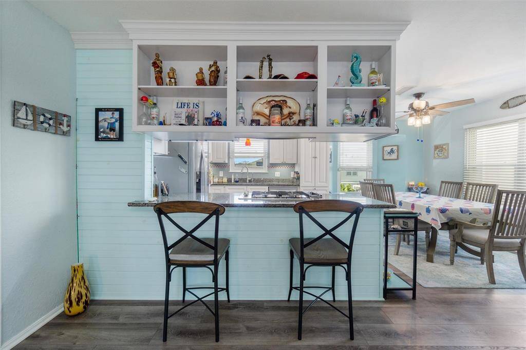Lots of space & light in the dining room.  Large table fits in her comfortably.