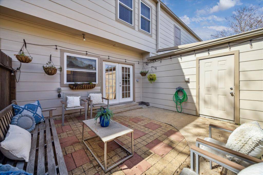 The utility room has a full-size washer and dryer and plenty of room for outdoor storage.