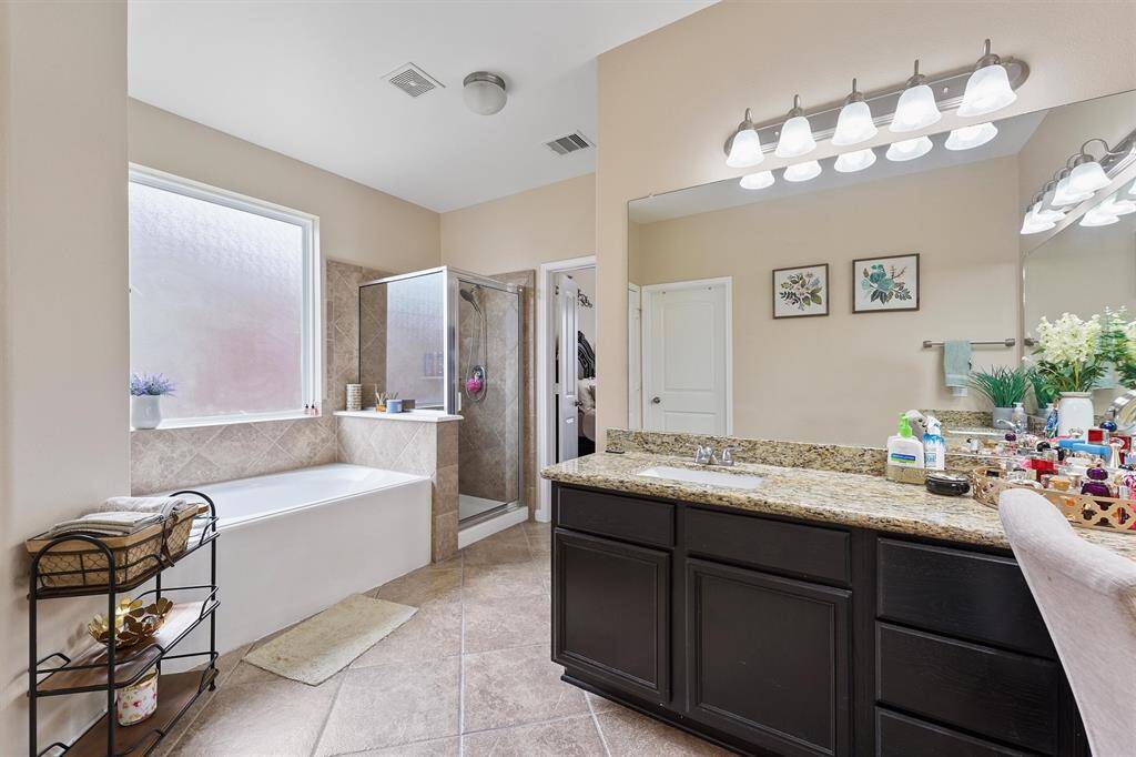 View of luxurious ensuite master bathroom