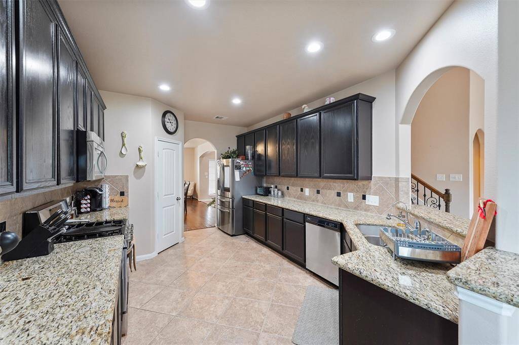 Kitchen with ample cabinetry