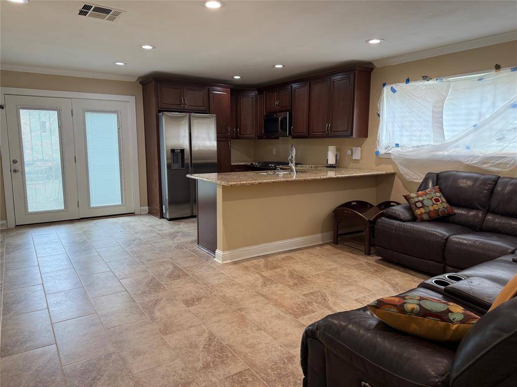 Den and kitchen area