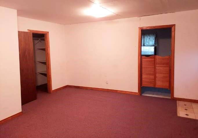 Living room notice closet and entry to kitchen in ADU