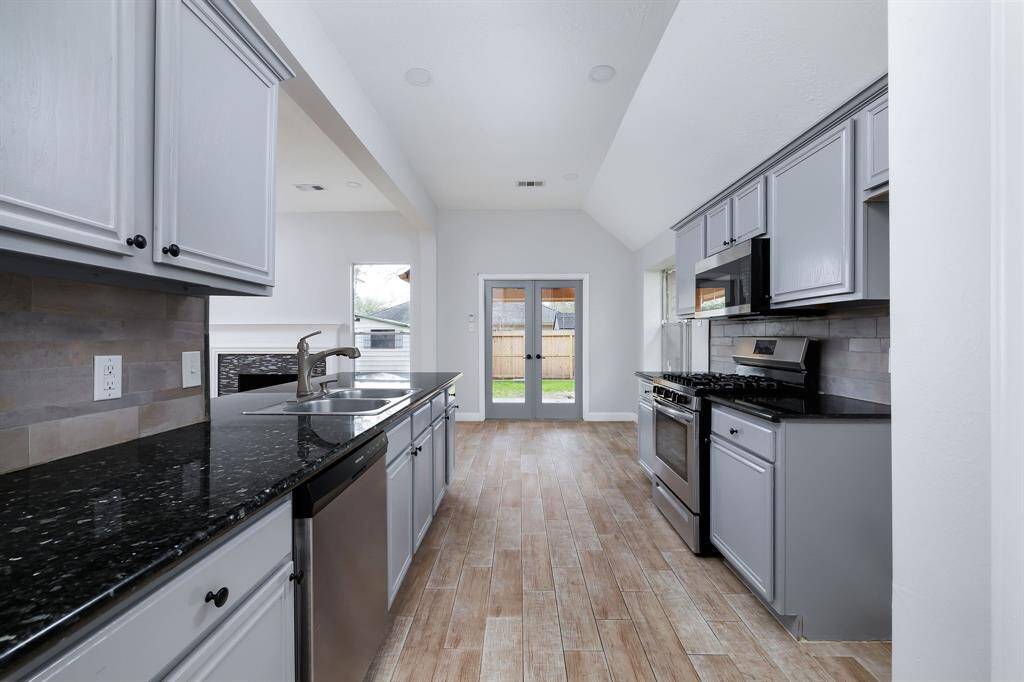 The kitchen features a new microwave and dishwasher!