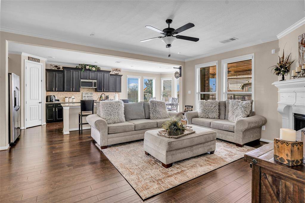 Additional view of the open flow between kitchen and living.