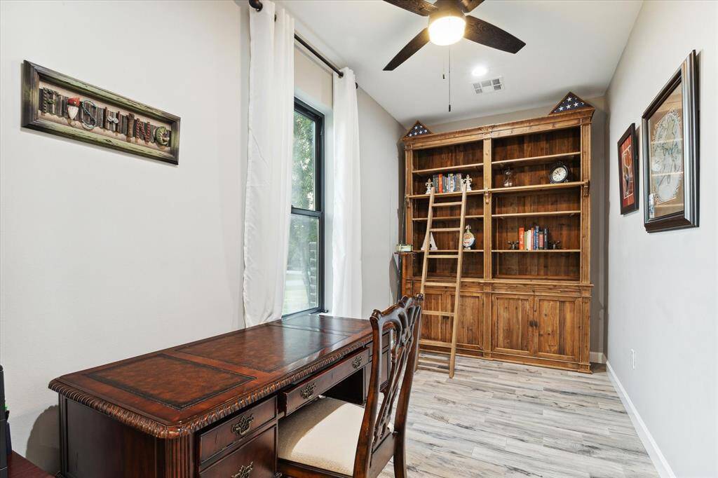 Great flex space for home office or ideal for a craft room or a  work out area.