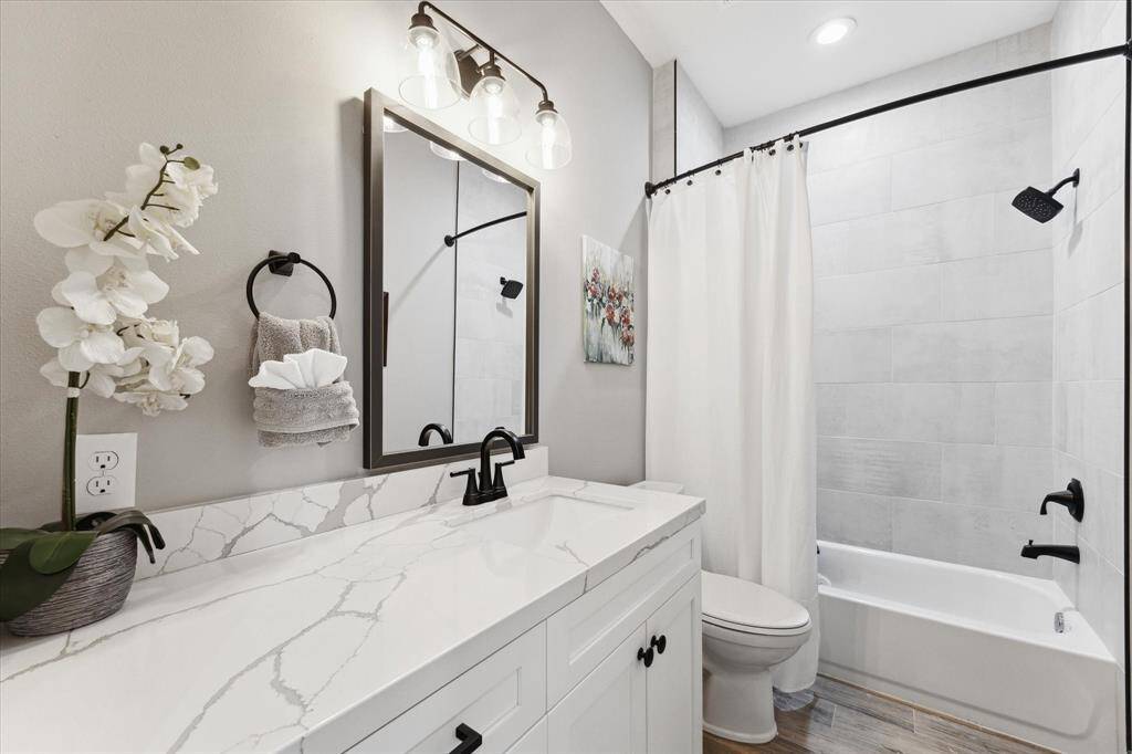 Secondary bath completes the main house with the same high-end finishes.