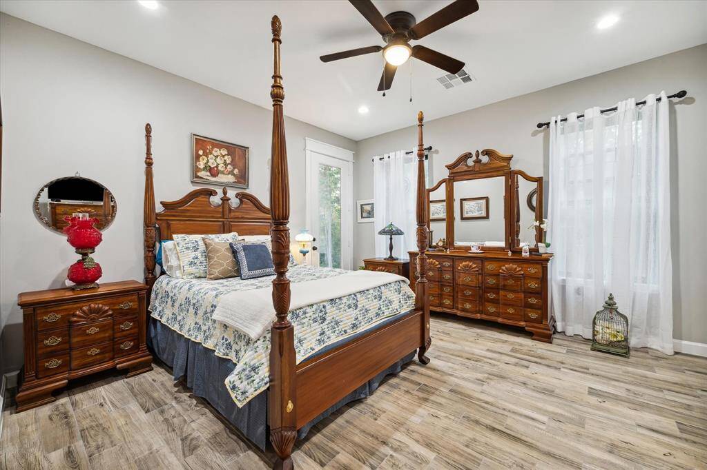 Guest suite retreat bedroom is spacious and inviting for a restful relaxing evening.