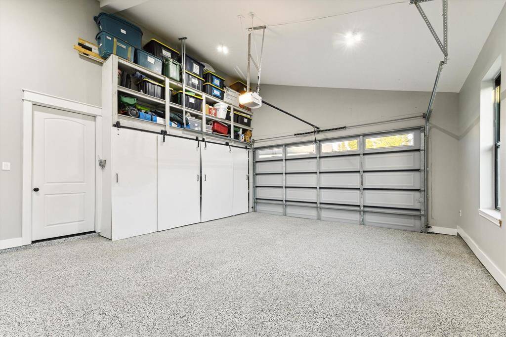 This is not your average 2-car garage.  It features epoxy floors and so much storage.