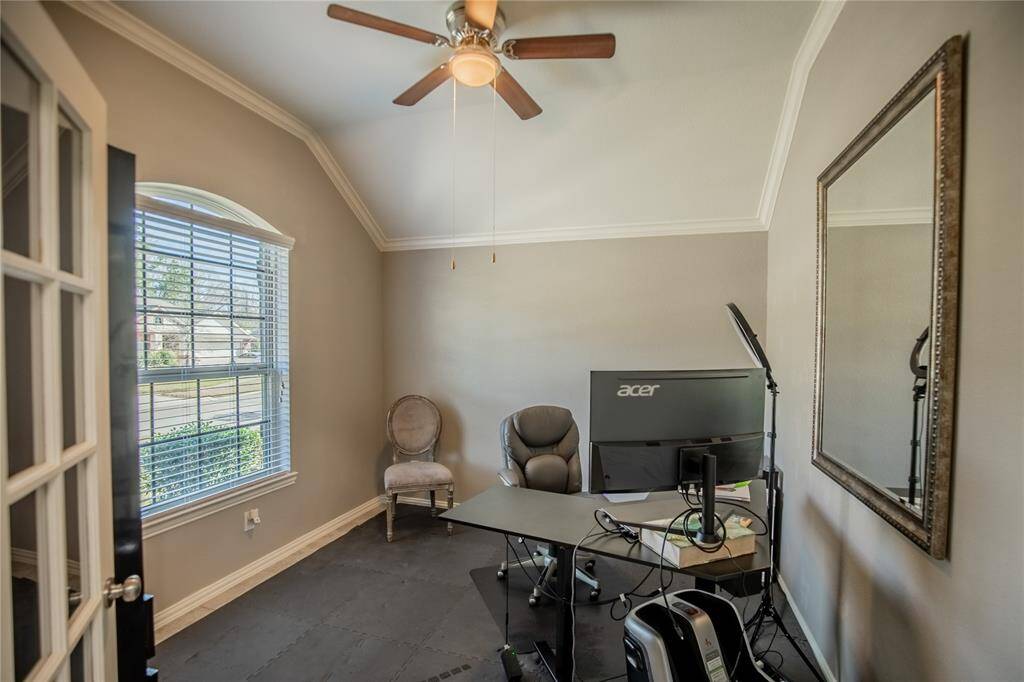 Private study with French doors located off the entry