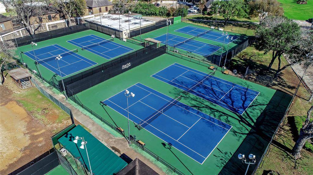 Stay active and enjoy friendly competition at the Sugar Creek Country Club’s premier tennis and pickleball facility! Featuring multiple well-maintained courts with professional lighting for evening play, this amenity is perfect for players of all skill levels. Whether you're sharpening your game or just enjoying a casual match, these courts provide a fantastic space to connect with neighbors and embrace an active lifestyle.