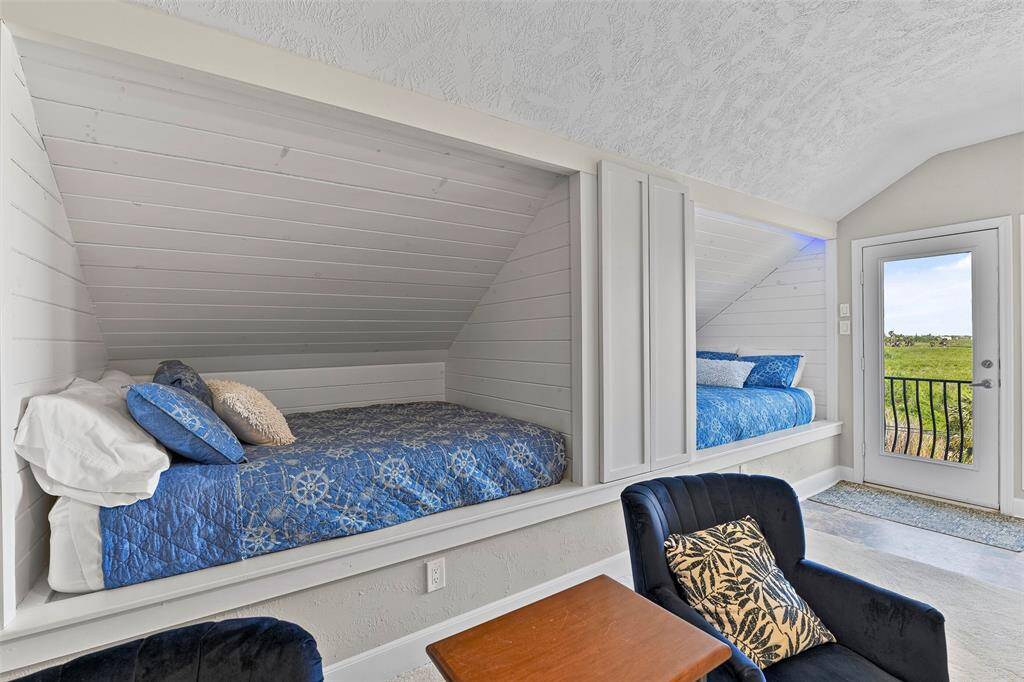 The guest suite has 2 full size beds are built-in. You also have access to the east and west facing decks.
