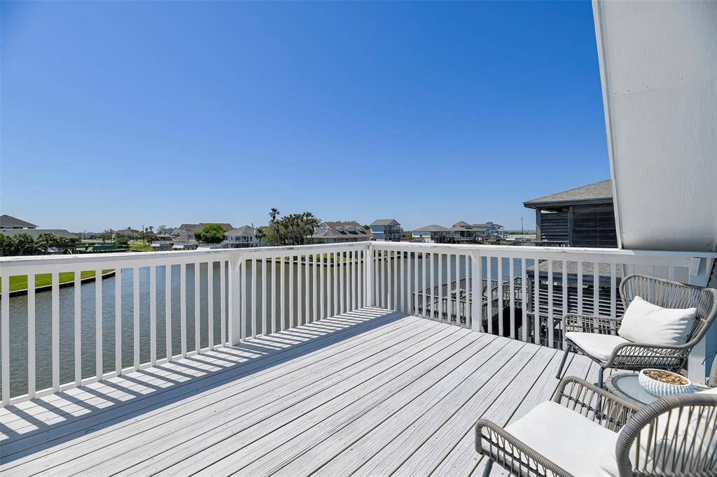 Down from the bathroom you can exit to the west facing deck. From this deck you have incredible bay views.