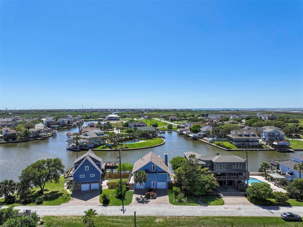 Look at how the home is located on the main canal, at the opening of another canal & no home across the canal from it because that lot is used for a neighbors pool!
