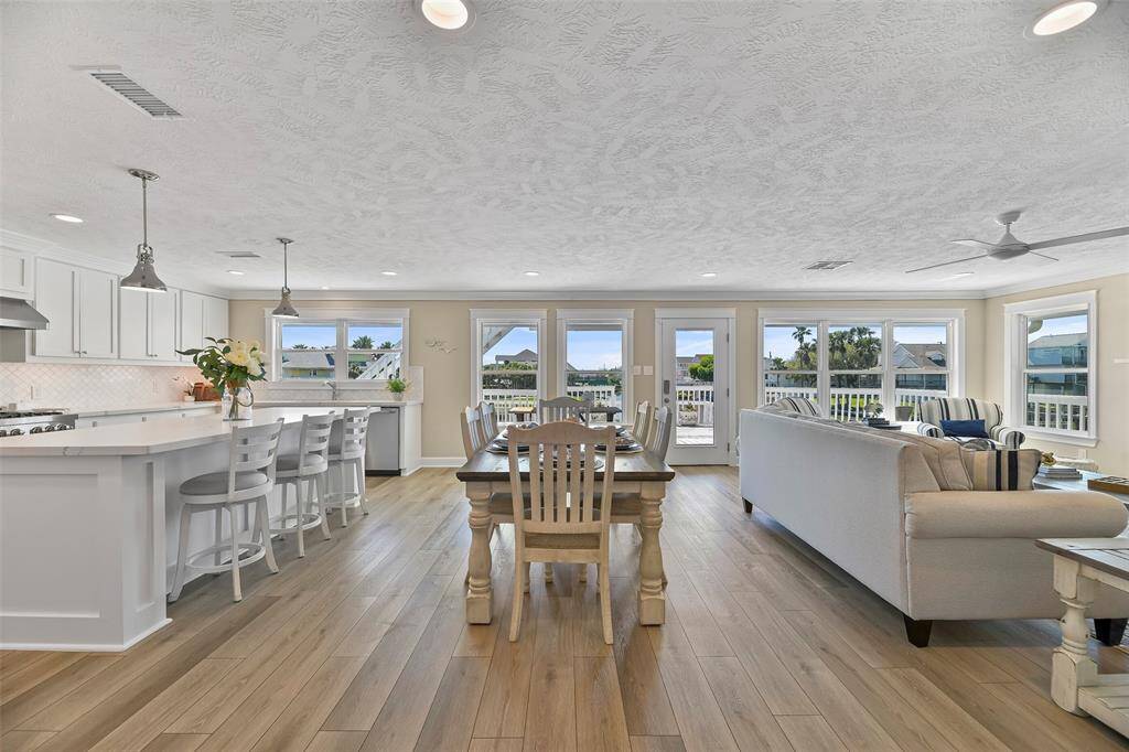 Fantastic open floor plan! All of the updated windows feature a wood casing
