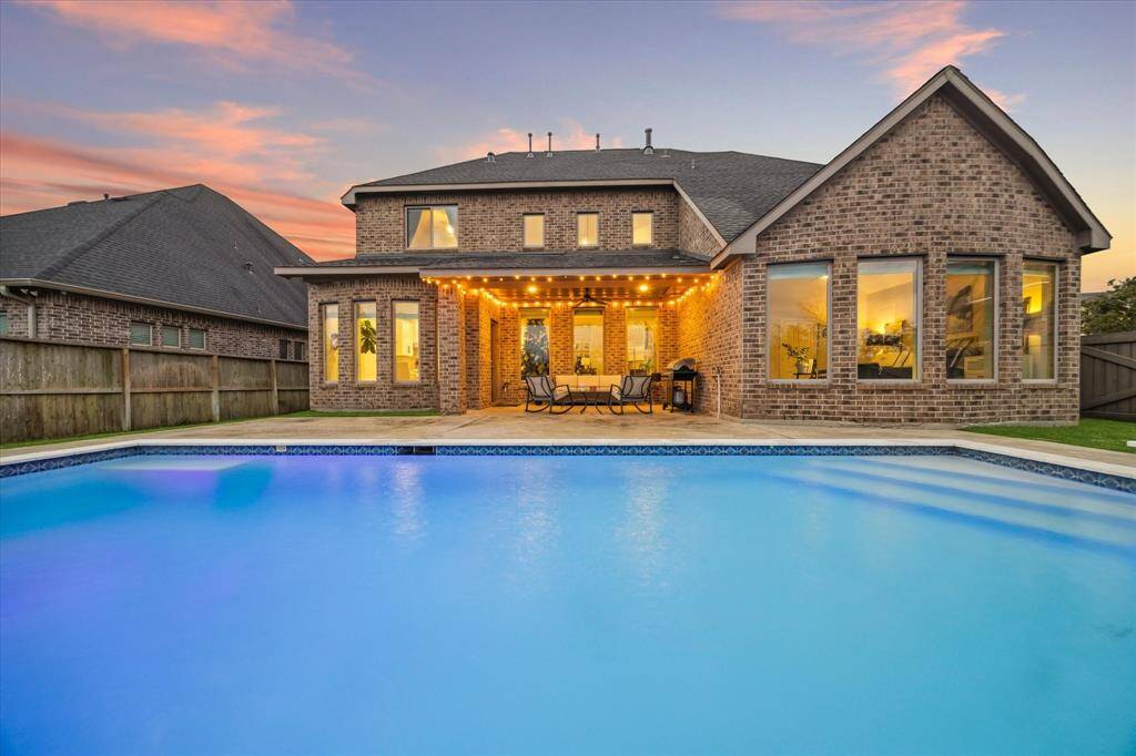 Explore your dream home at 4418 Million Bells Way in Richmond's Harvest Green!