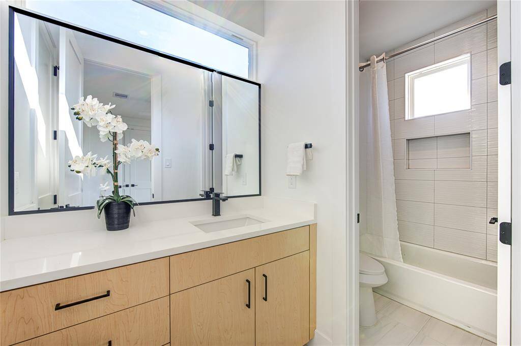Secondary bedrooms conveniently share a Jack/Jill bathroom