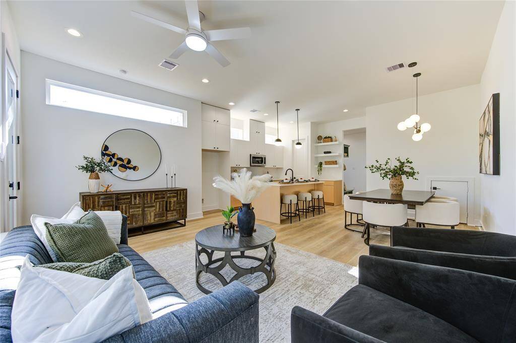 Comfortably entertain your guests with this open concept living area