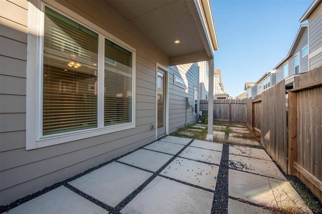 Backyard with Covered Patio and Pavers