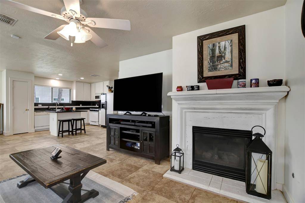 NOTICE THE COZY FIREPLACE