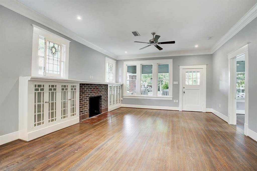 Open living room with wood burning fireplace