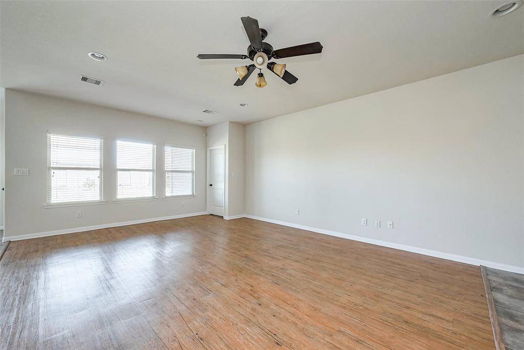 Living area leading to the master bedroom.